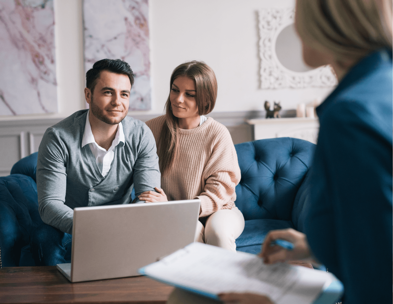 California drivers reviewing affordable auto insurance options with an agent